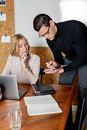 Man and Woman Sitting at Table