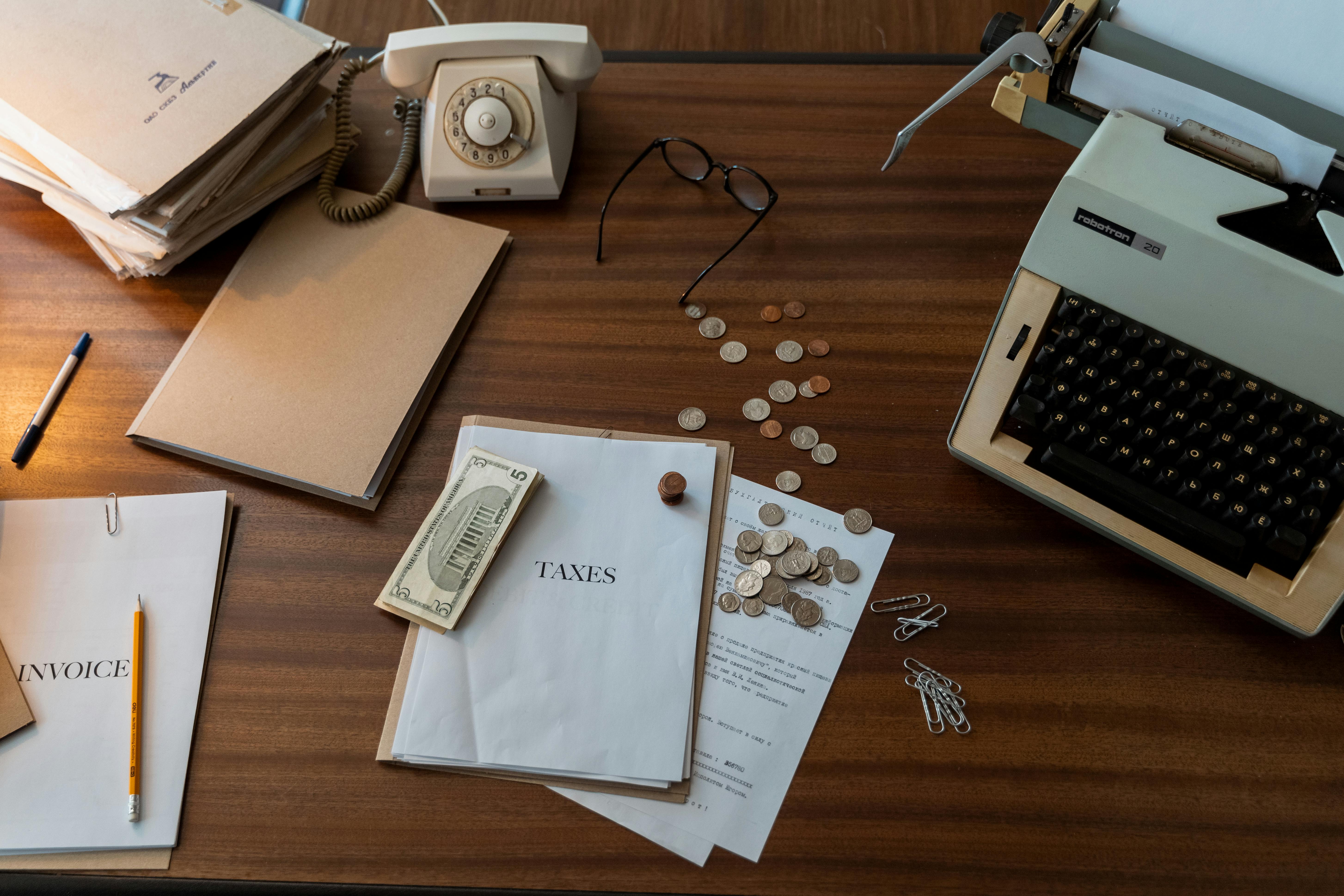 top view shot of workspace on a wooden table