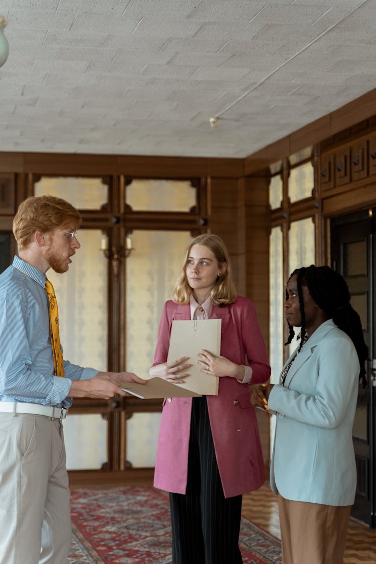 A Boss Talking To His Employees