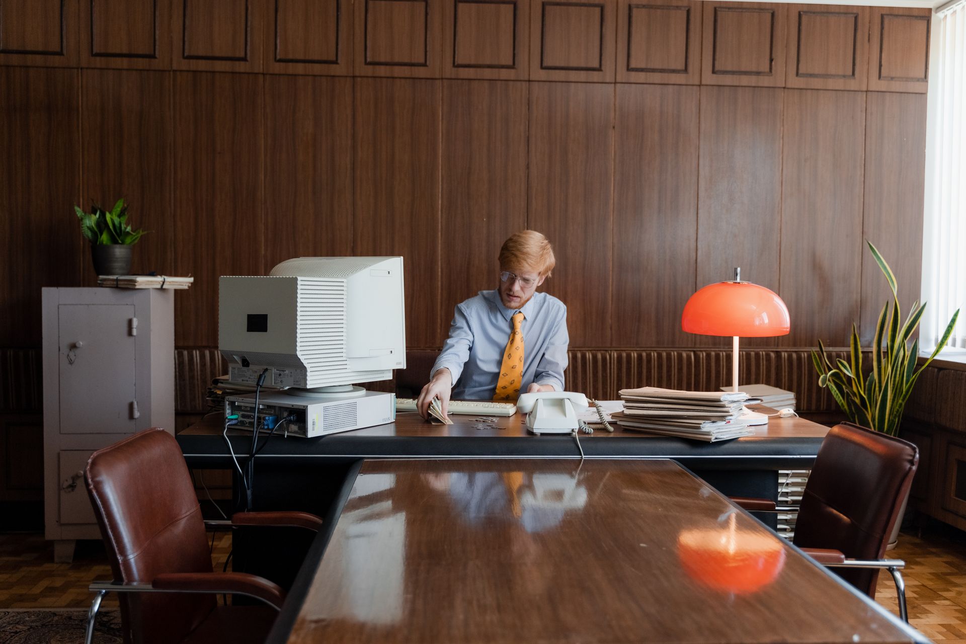 A Man Sitting in the Office