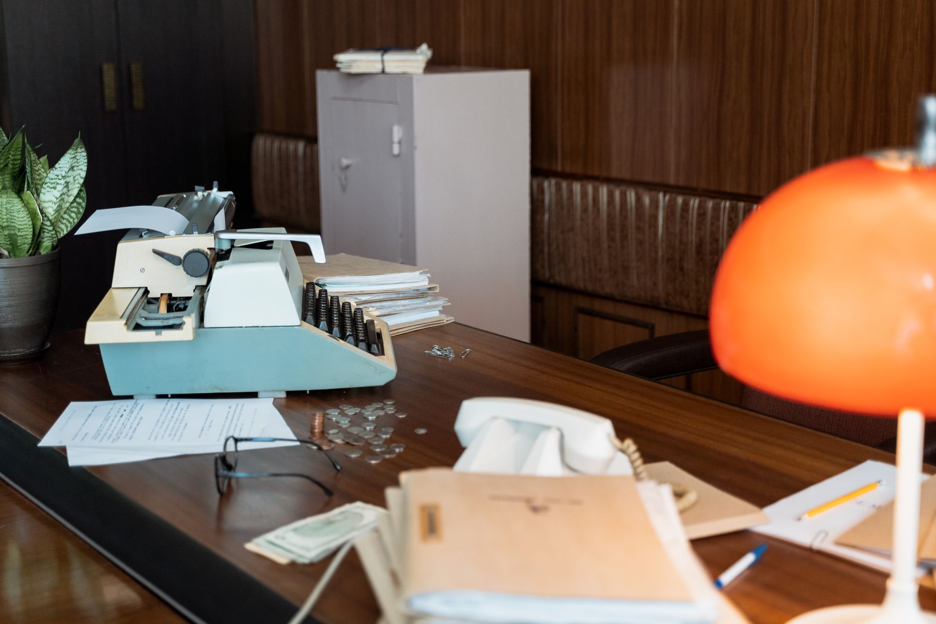 Editorial photo for Can I Sue My Ex Employer for Not Paying Me, showing employment records and workplace documents.