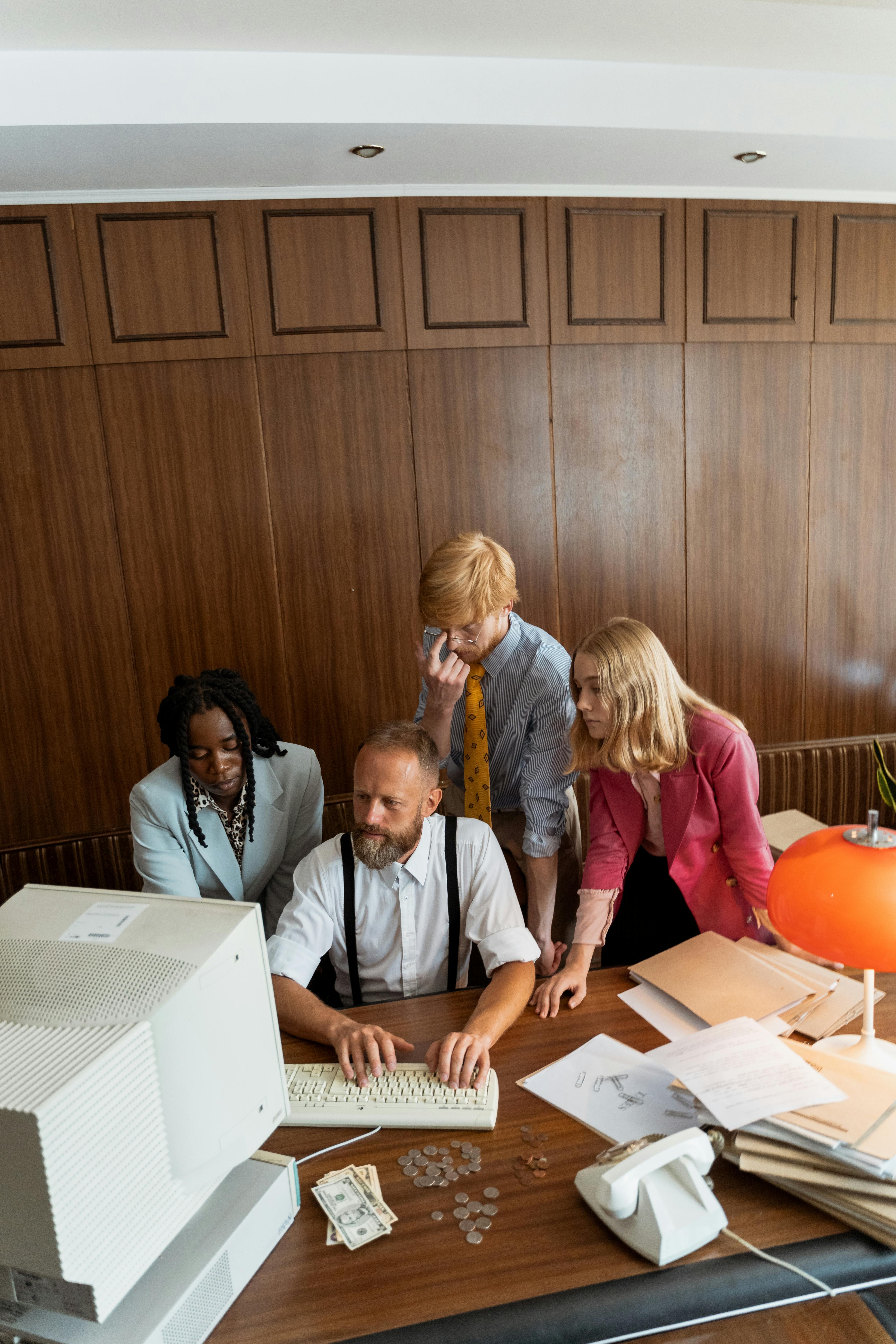 businesspeople looking at the computer monitor