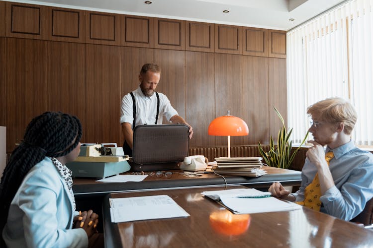 A Man Looking Inside His Briefcase