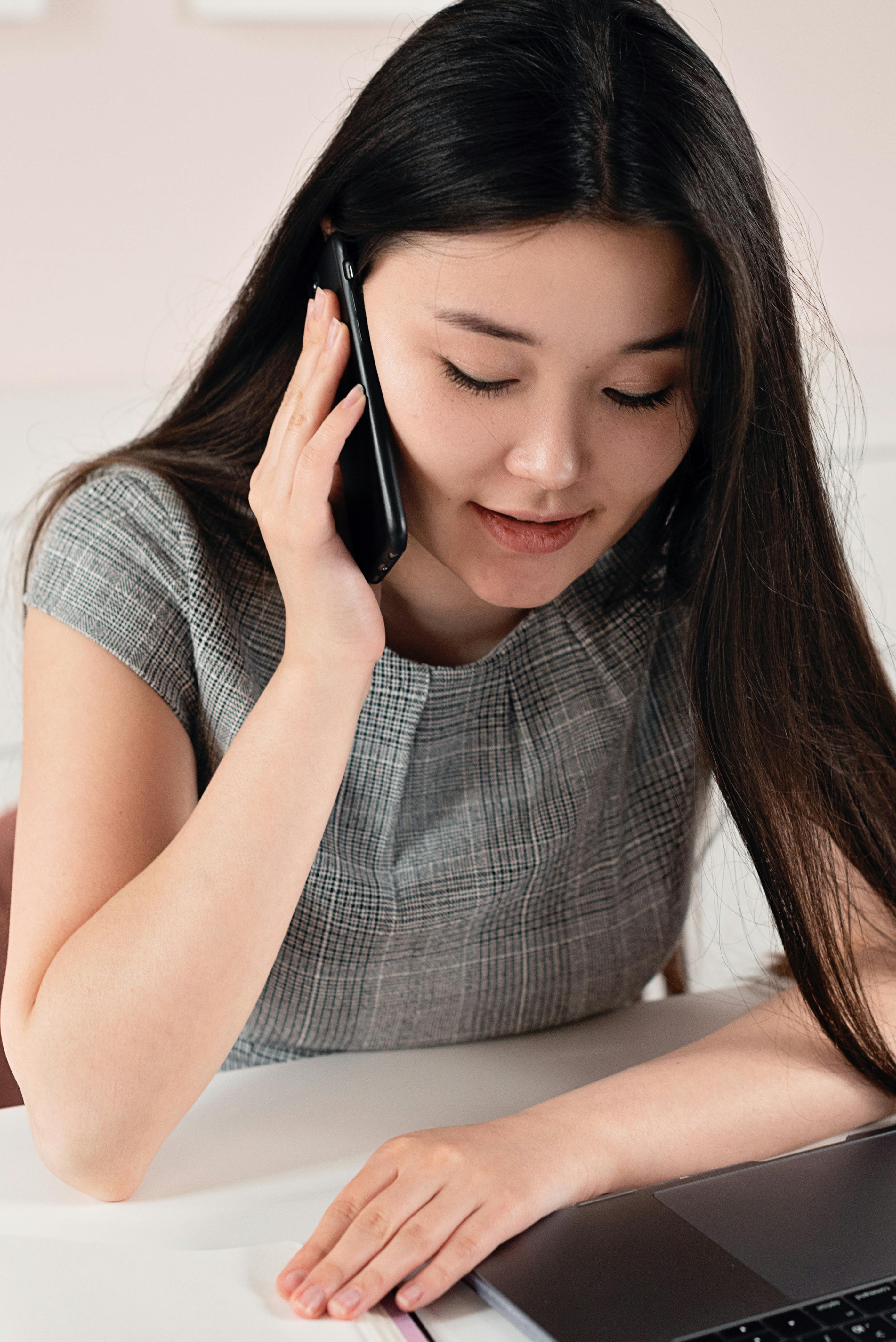 portrait of a woman talking on her cell phone