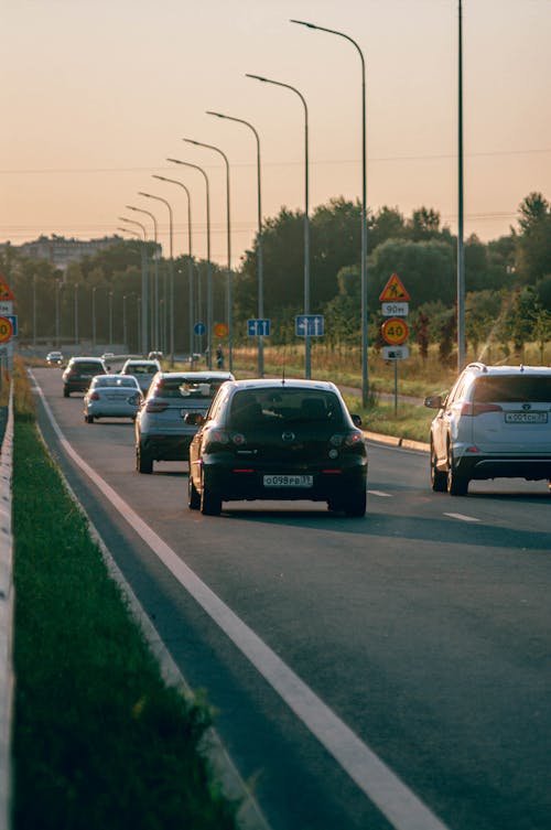 Vehicles on the Road at Dusk