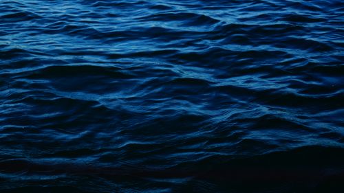 Free Captivating image of blue ocean waves creating mesmerizing ripples and texture. Stock Photo
