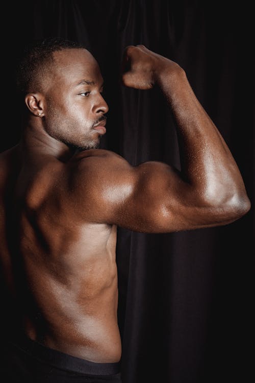 A Man Flexing his Biceps