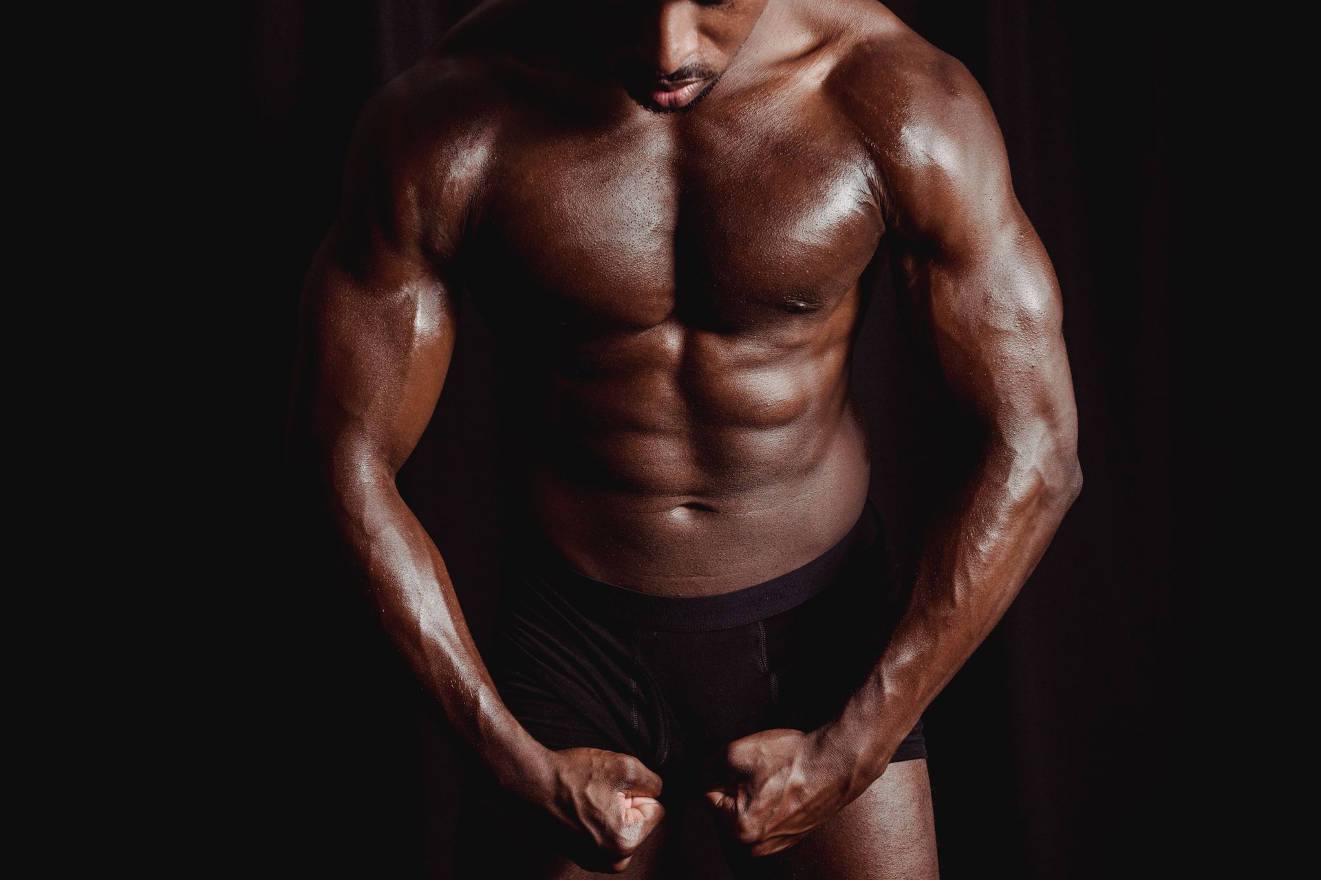 Bodybuilder Flexing his Muscles