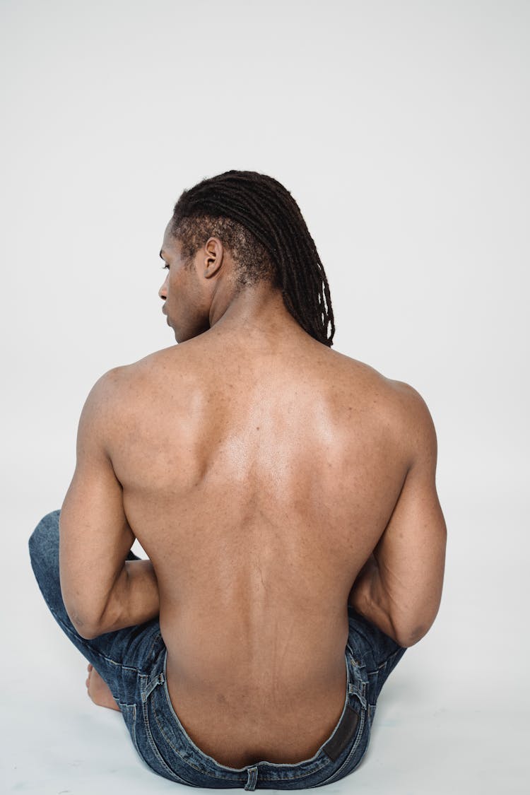 Bare Back Of A Shirtless Man