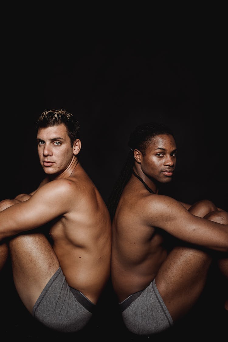 Naked Men In Underwear On Black Background