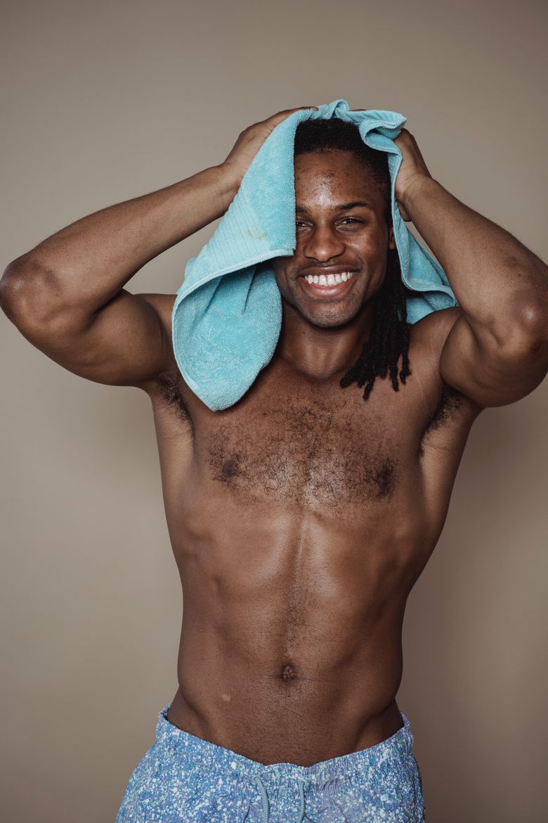 Grinning athlete with a towel after a session — Mike Jones on Pexels
