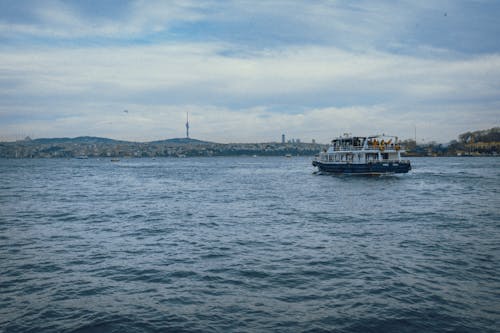 Ferry Boat Traveling the River