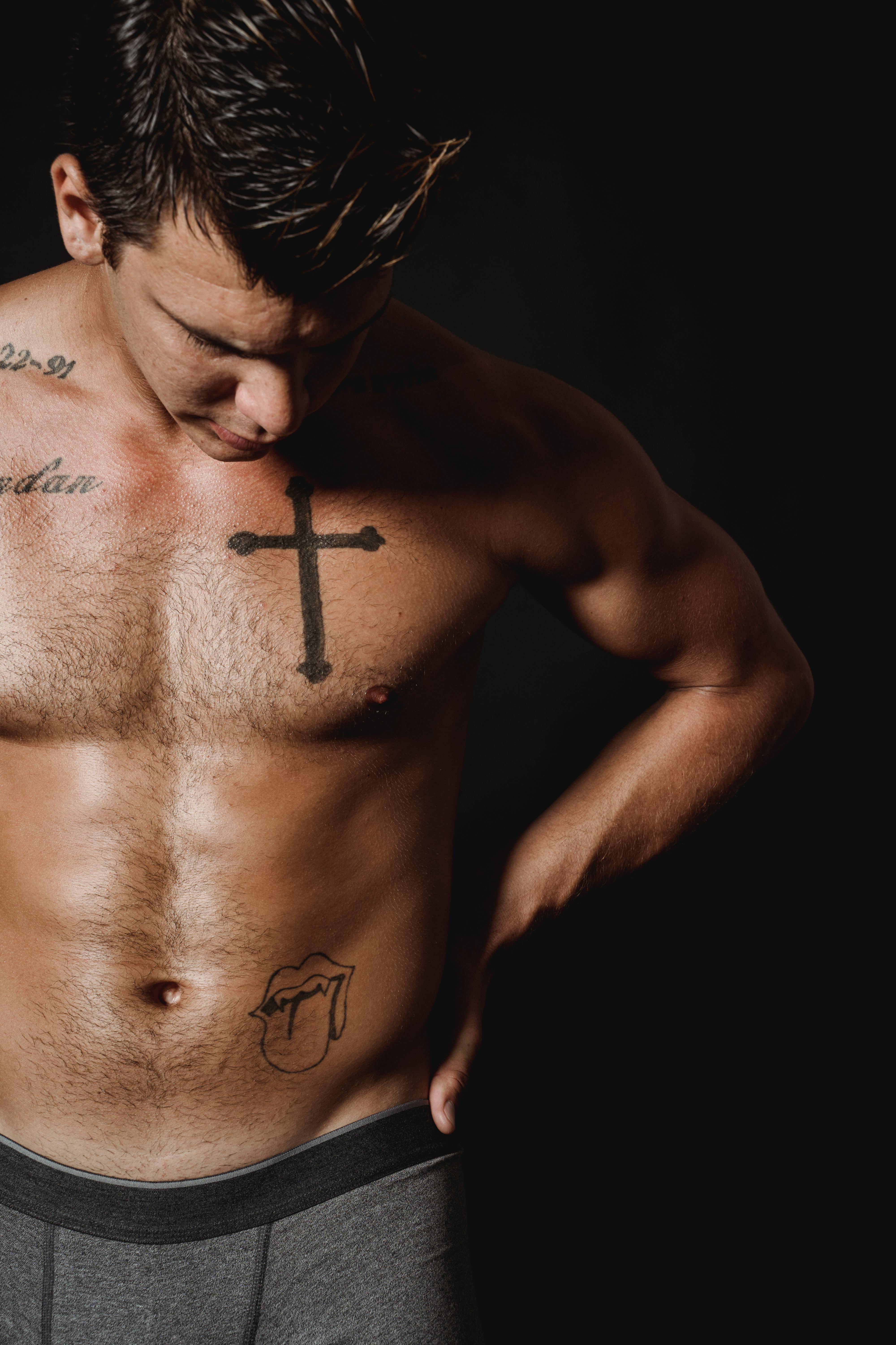 A Man With Tattoos in His Body · Free Stock Photo