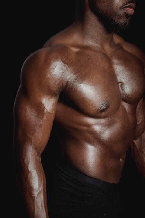 Free Photograph of a Shirtless Bodybuilder Stock Photo