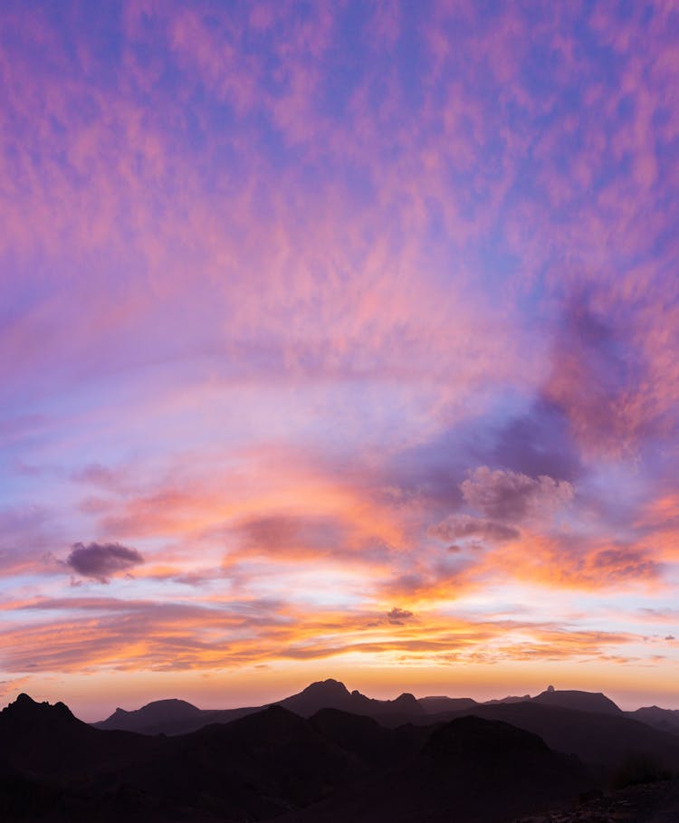 Scenic Pink Sunset Above Mountains