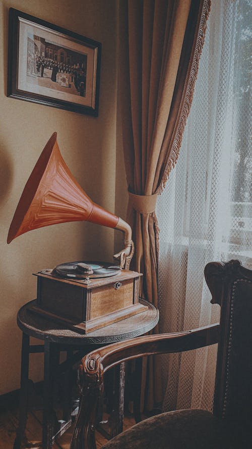 Vintage Record Player on a Brown Wooden Table 
