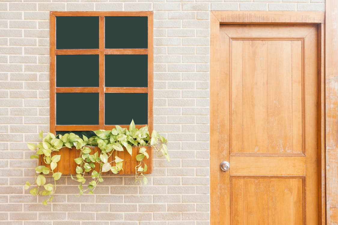 Photo of Wooden Door Near Window