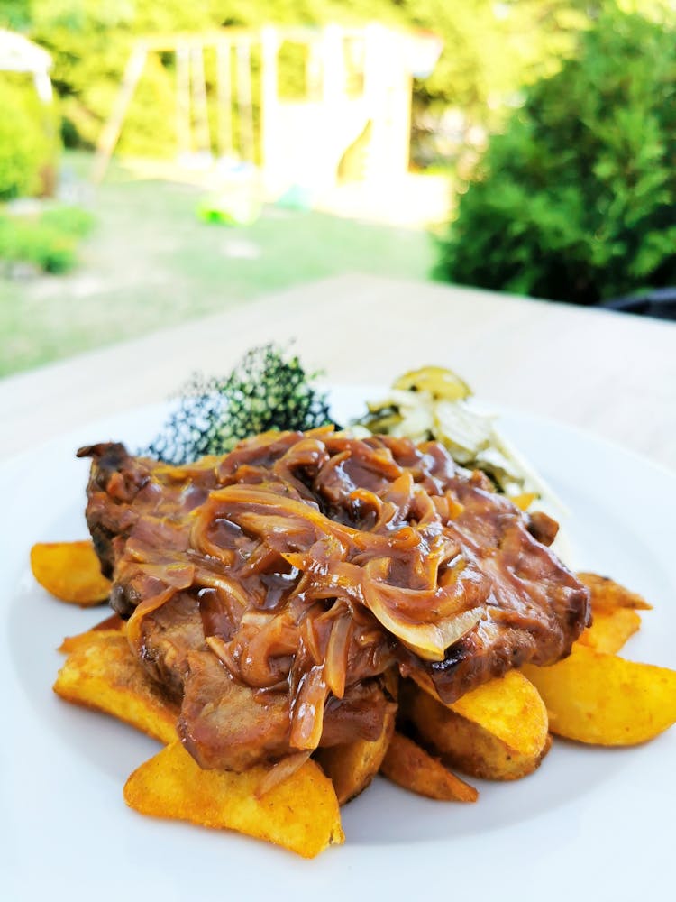 Close-up Of Liver, Bacon And Onions