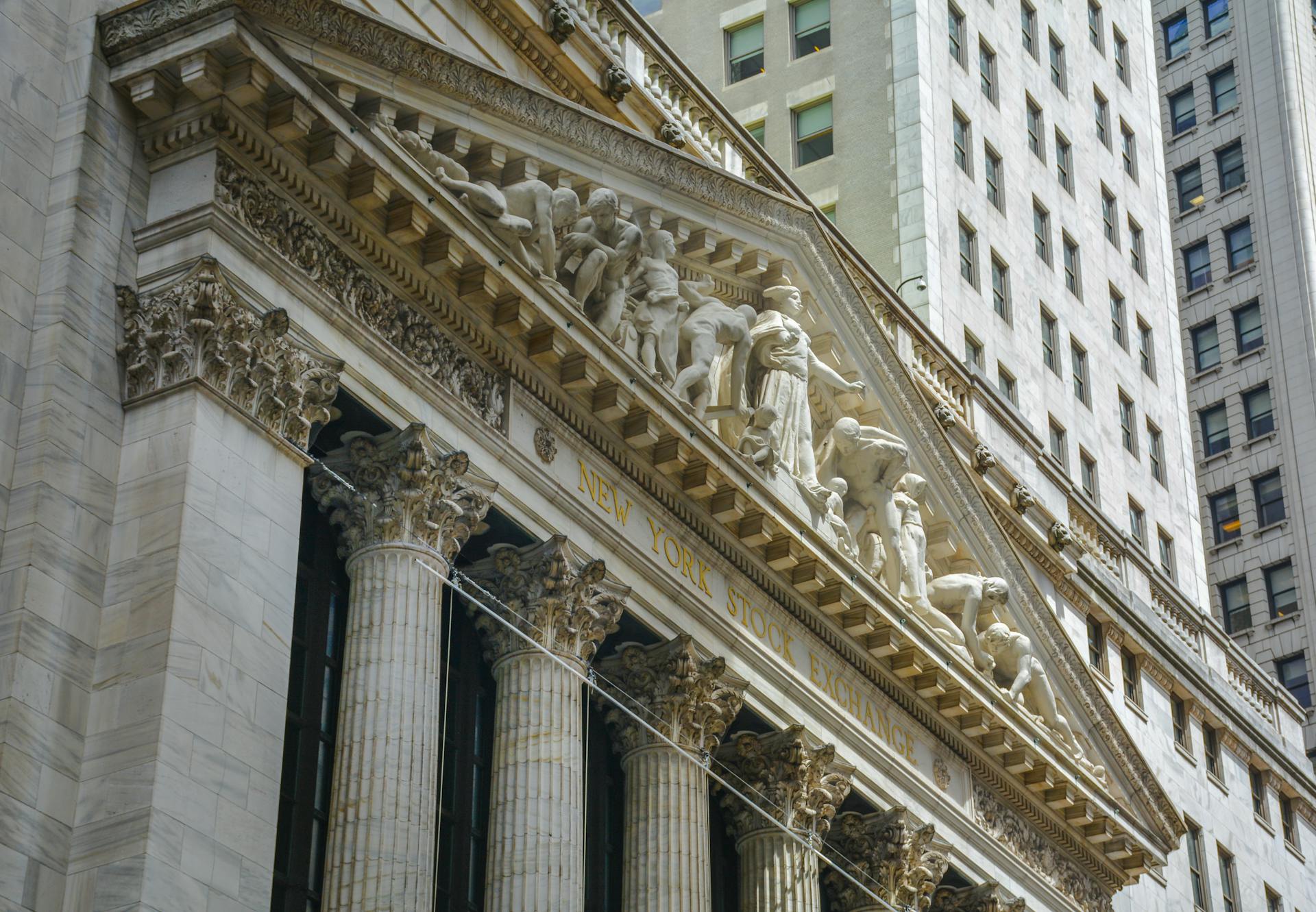 Classic architecture of the New York Stock Exchange facade in NYC.