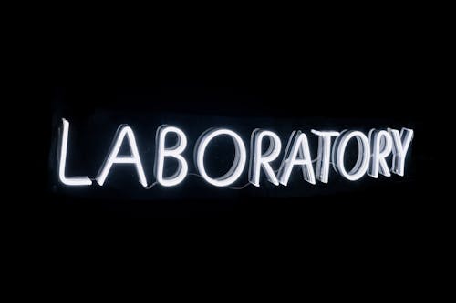Illuminated Laboratory Neon Signage · Free Stock Photo