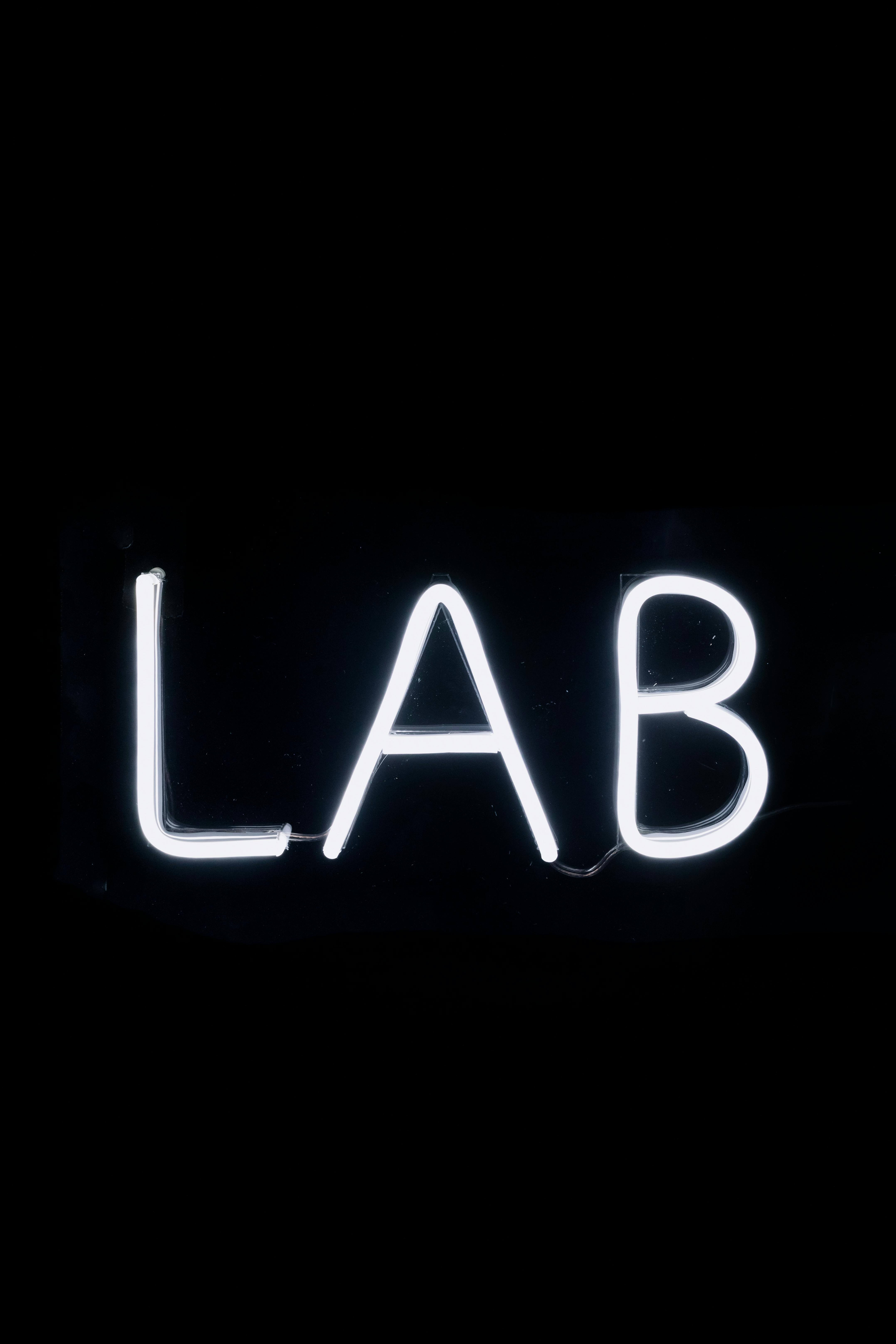 Illuminated Laboratory Neon Signage · Free Stock Photo