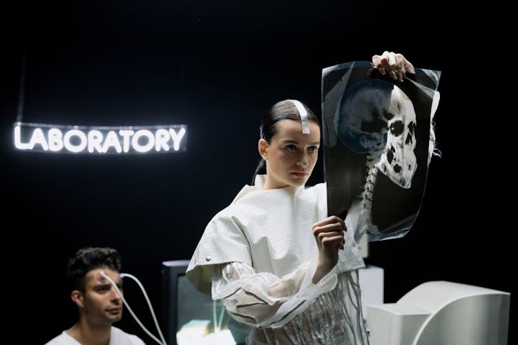 Woman Holding An X-ray Film