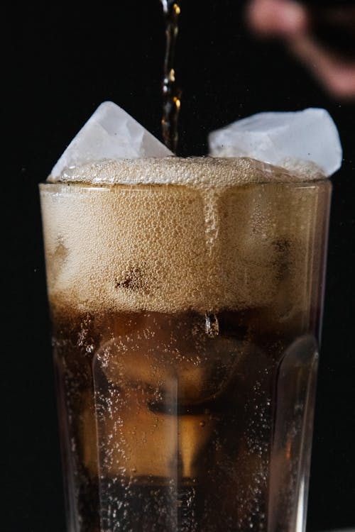 Free Close-Up Shot of a Soft Drink with Ice Cubes  Stock Photo