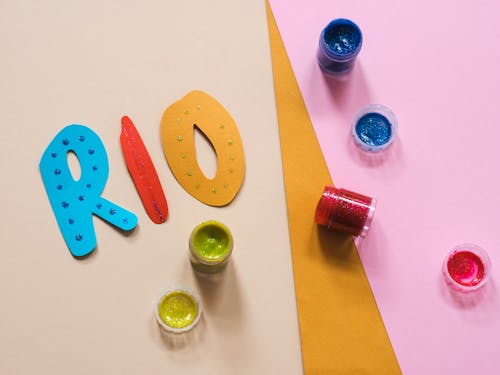 Free Rio Text and Colorful Paints around Stock Photo