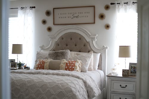 Bedroom with White Walls and Curtains