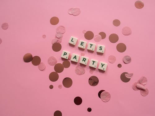 Scrabble Tiles on a Pink Surface