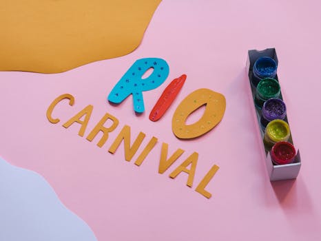 Colorful Rio Carnival themed art pieces with glitter and paints on a vibrant background.
