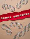 Paper Cutouts Beside the Scrabble Tiles