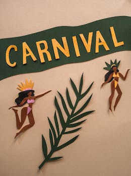 Colorful paper cutout art celebrating carnival with dancers and leaves.