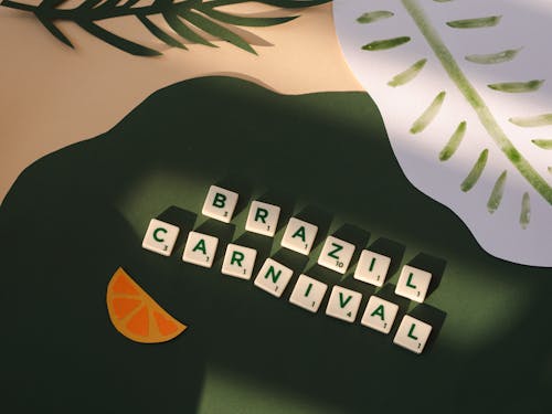 Brazil  Carnival Spelled on Scrabble Tiles Designed with Paper Leaves and a Slice of Lemon