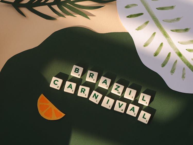 Brazil  Carnival Spelled On Scrabble Tiles Designed With Paper Leaves And A Slice Of Lemon