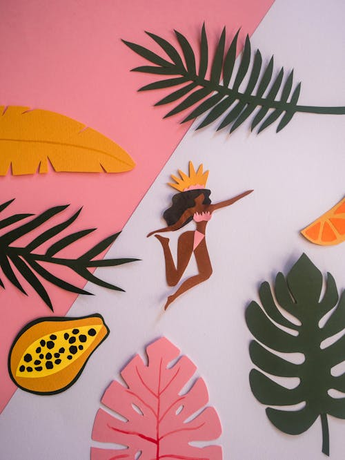 Colorful Paper Cut Outs on a Surface