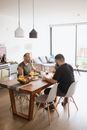 Men Having Breakfast at Home