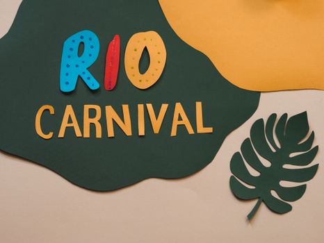 Vibrant Rio Carnival text with colorful paper cutout design. Perfect for festive themes.