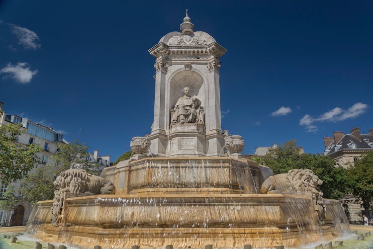 The Fontaine Saint-Sulpice With The Statue Of Auguste Fauginet In Paris, France