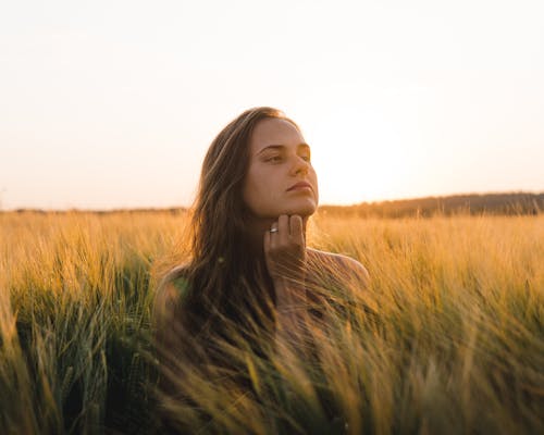 Close-up Shot of a Woman in the Farmland