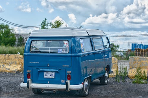 Photograph of a Blue and White Van 