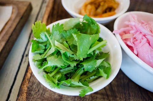 Green Leafy Vegetable on White Ceramic Bowl