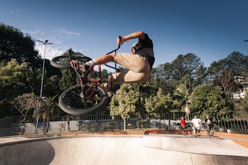 A Man Doing a Trick with His Bicycle