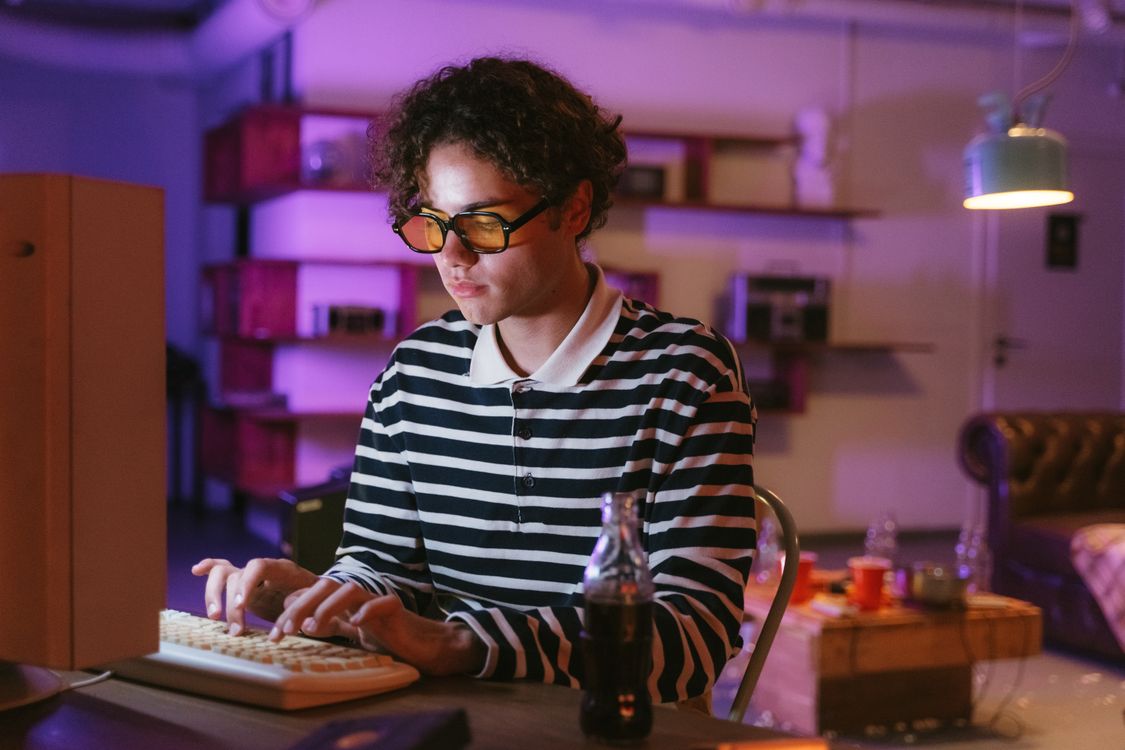 Geek Using Old Fashioned Computer · Free Stock Photo