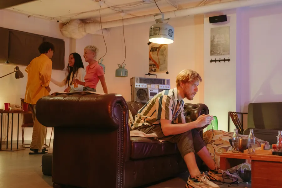 people laughing together at a gaming and music event