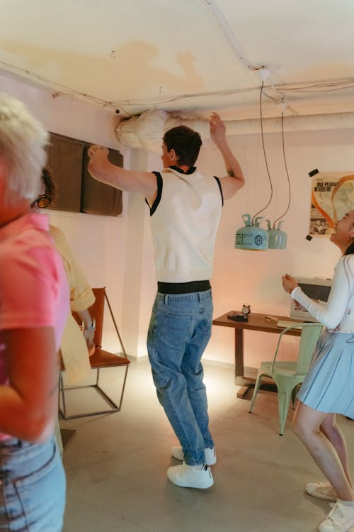 Free Teenagers Having Fun Dancing in a House Party Stock Photo