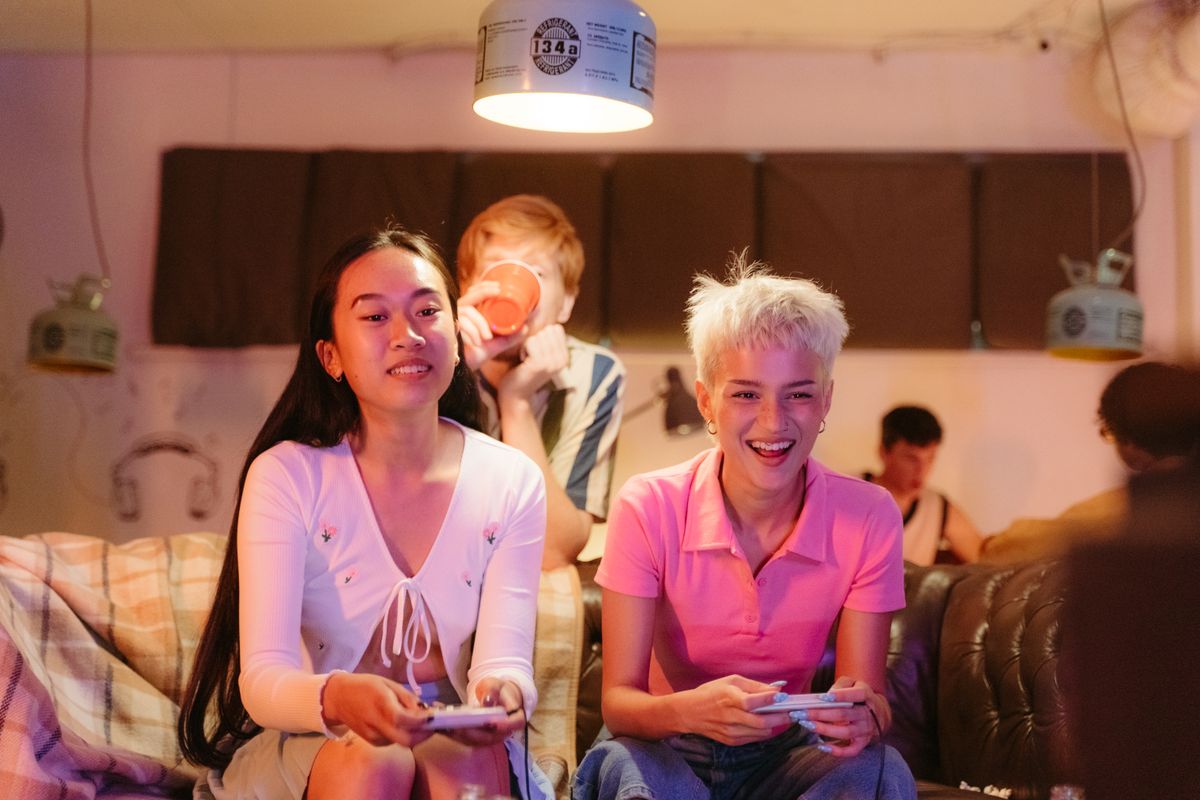 Teenagers playing computer games