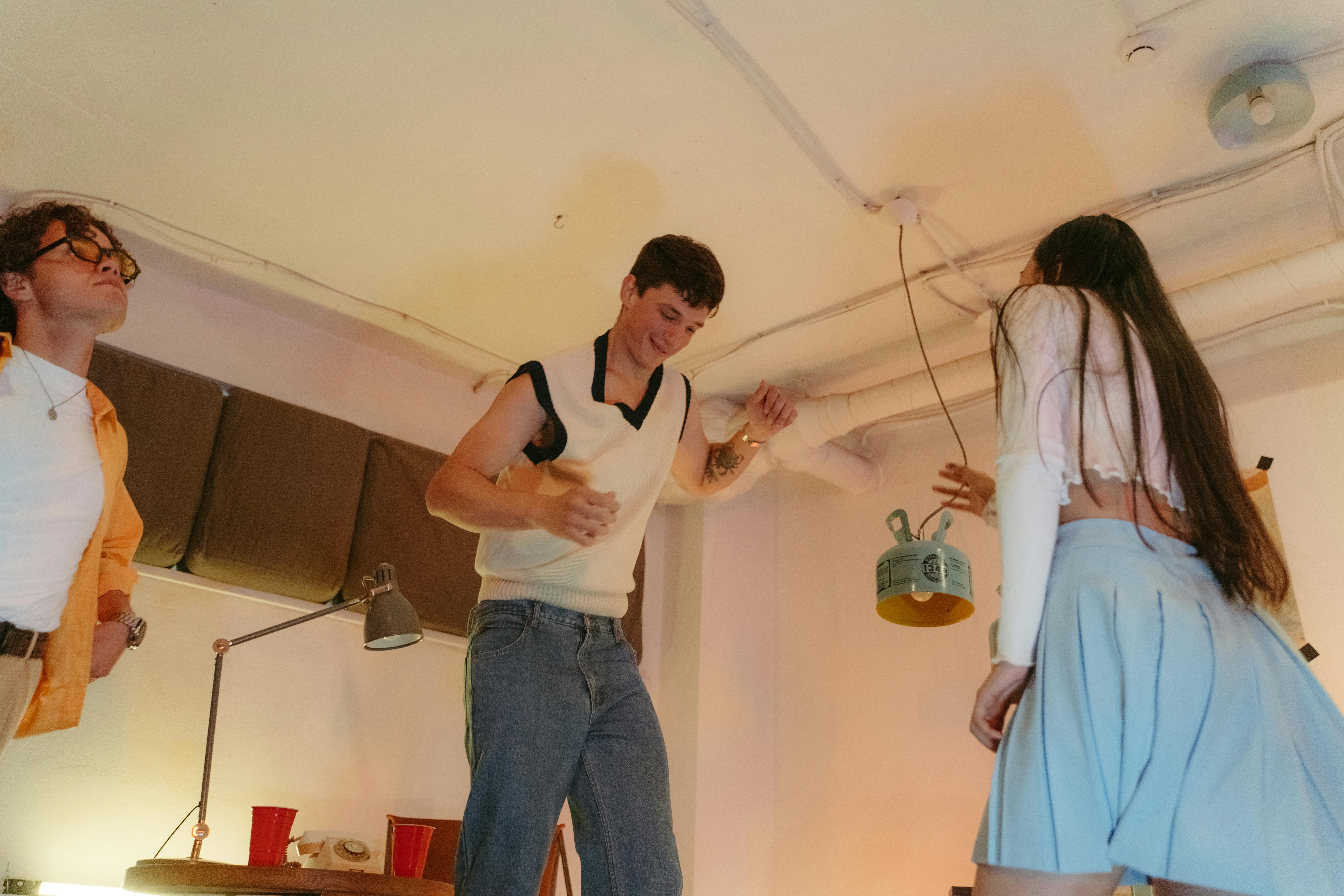 guests mingling in apartment event space - apartments with event space