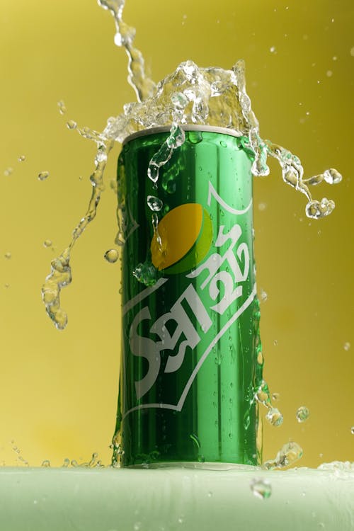 Photo of a Green Can with Liquid Spilling Over