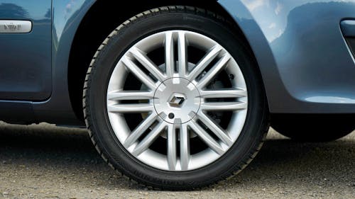 Free Photograph of a Blue Car's Wheel Stock Photo